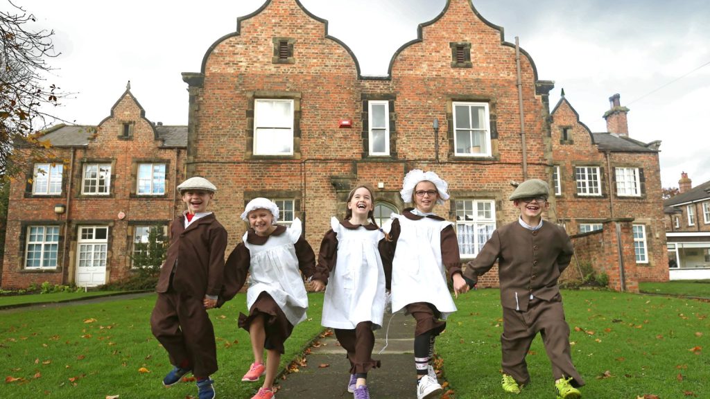 Children outside Ripon Workhouse at Easter