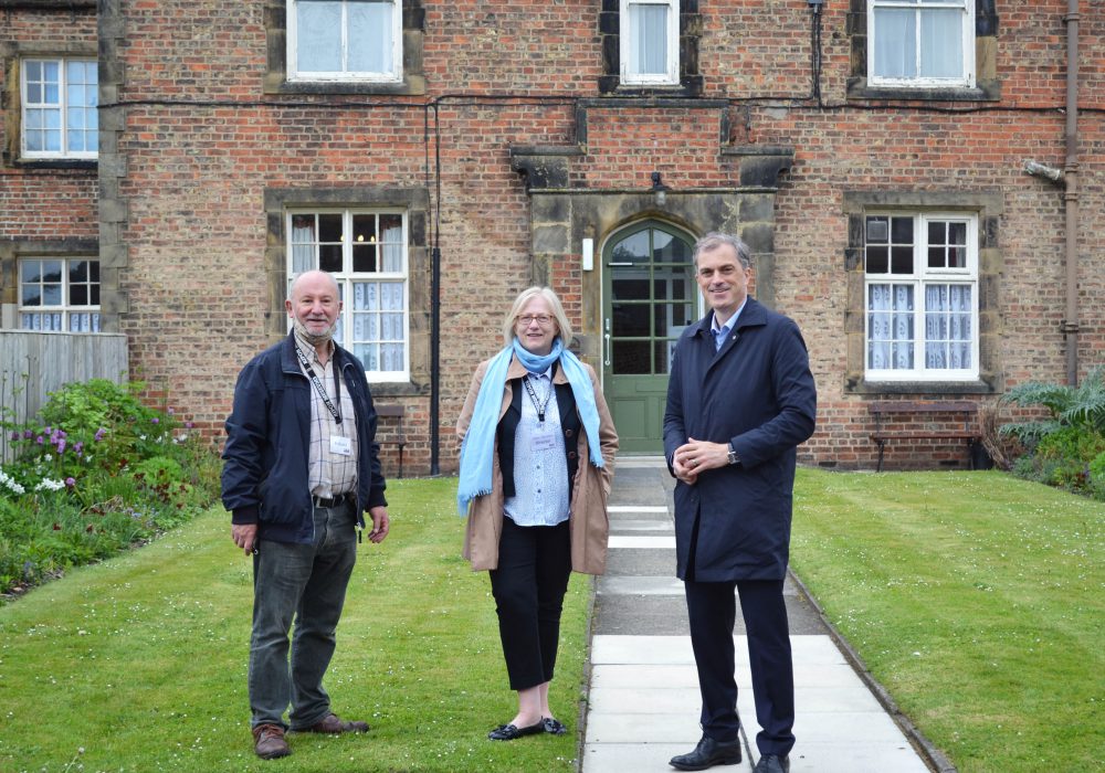Julian Smith MP outside the Workhouse Museum in Ripon with members of the museum team