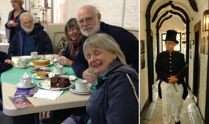 Visitors enjoying tea and cake and a volunteer dressed as a policeman at the Police and Prison Museum.