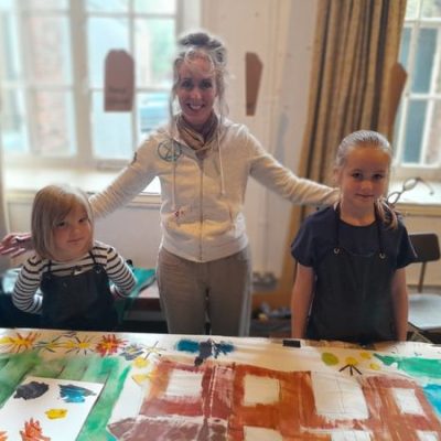 Artist and two young artists at Squigglers Club Ripon Museums